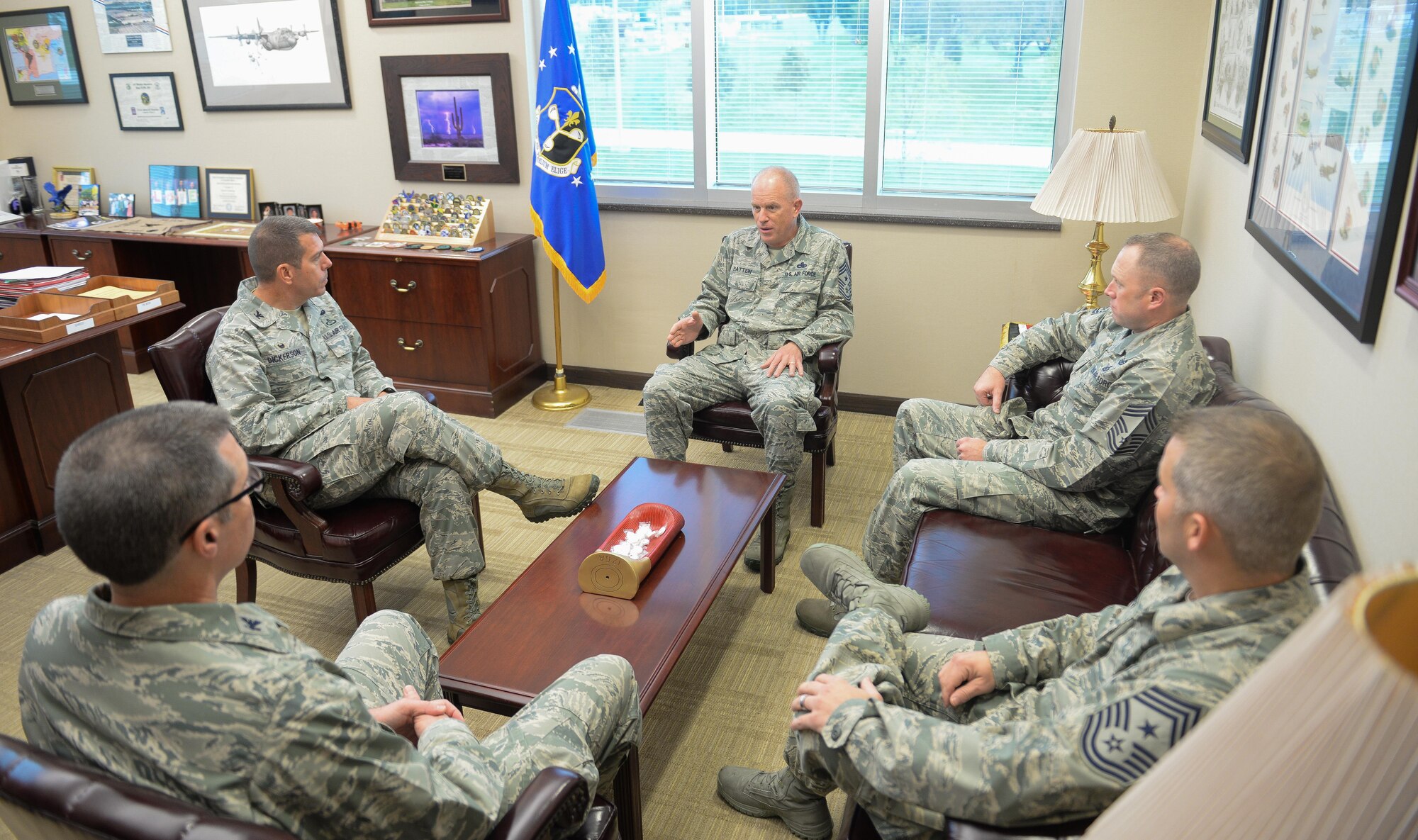 Command Chief Master Sgt. Frank Batten III, center, Air Combat Command's command chief, speaks with senior leaders of the 557th Weather Wing, including Col. Steven Dickerson, 557th WW commander, second from left, at Offutt Air Force Base, Oct. 4, 2017. Batten came to Offutt to see and experience all the base had to offer, and to meet the Airmen that drive the mission.