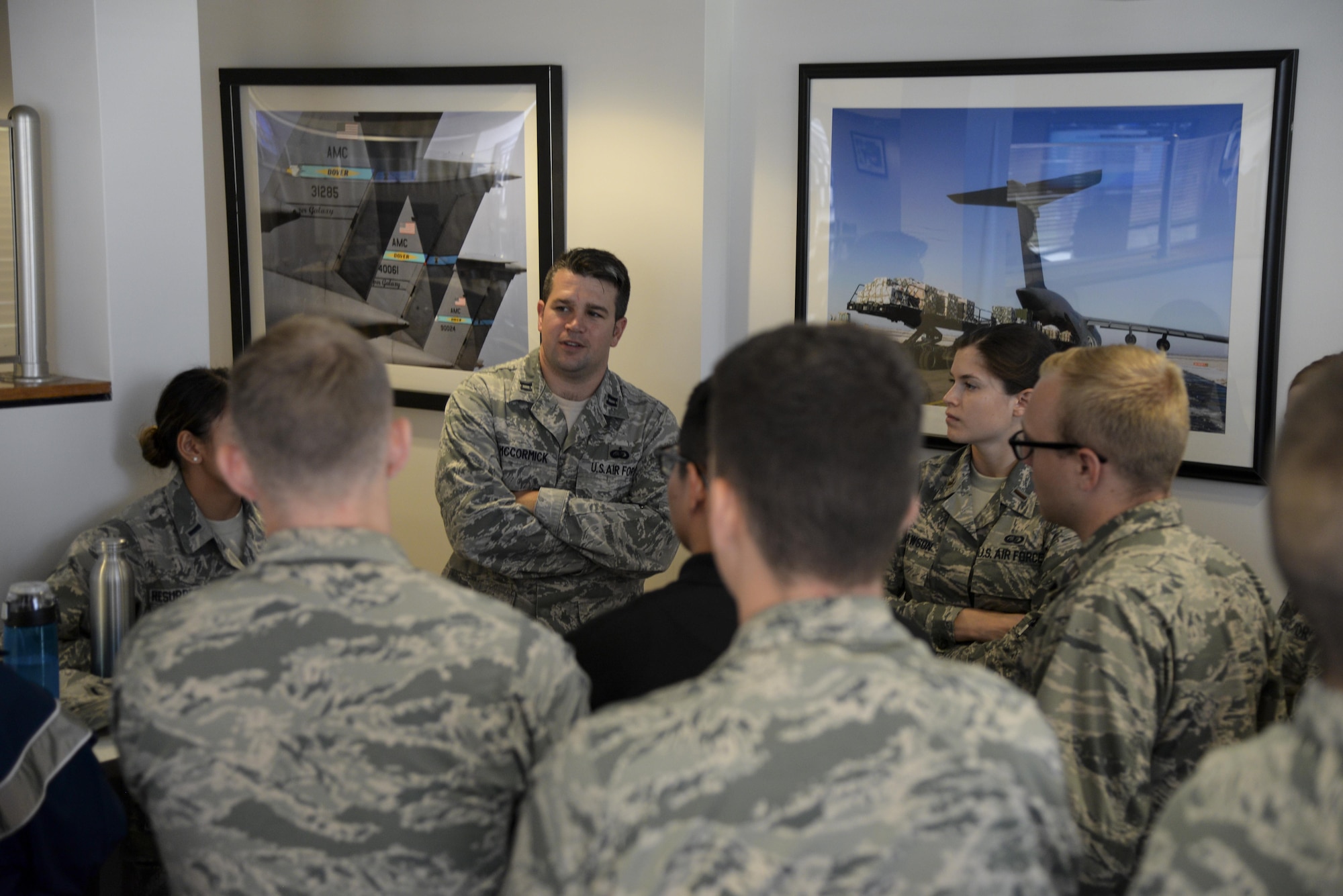 Capt. John McCormick, Air Force Mortuary Affairs Operations chief of the port mortuary branch, speaks to a group of ROTC cadets about his experiences as an active duty officer Oct. 11, 2017, during a Pathways to Blue tour at Dover Air Force Base, Del. About 40 local cadets had the chance to speak with company grade officers about their experiences in ROTC and how it correlated into their active duty career. (U.S. Air Force photo by Staff Sgt. Aaron J. Jenne)