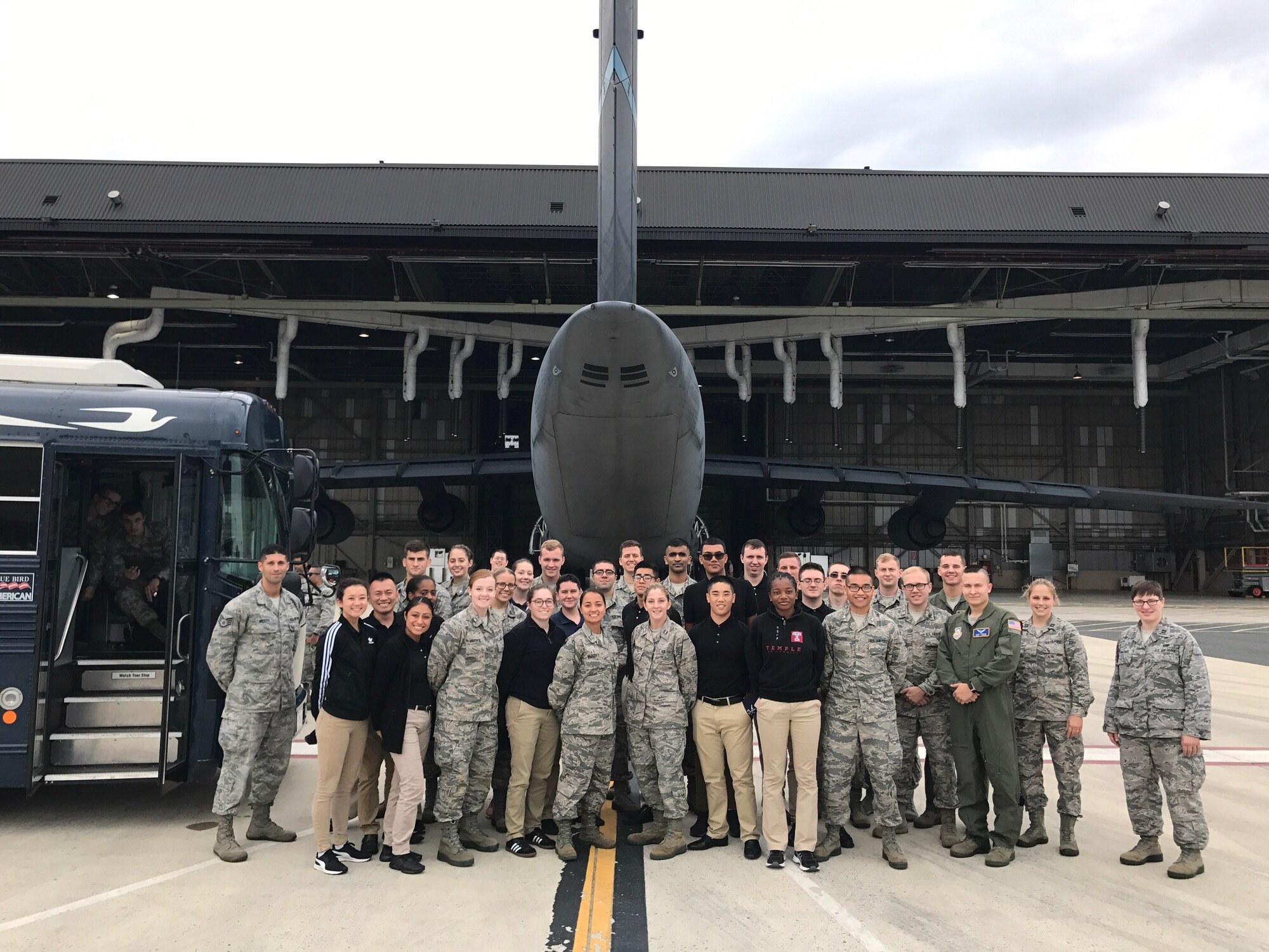 A group of ROTC and Junior ROTC cadets from local schools pose for a group photo in front of a C-5M Super Galaxy Oct. 11, 2017, during a Pathways to Blue tour at Dover Air Force Base, Del. The cadets toured several squadrons and spoke with more than a dozen officers during the tour to get a behind-the-scenes view of military service. (Courtesy photo)