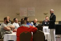 Colonel David Fallon, Commanding Officer, 9th Marine Corps District, speaks to wrestling coaches during the Wrestling Coaches Association's Leadership Academy in Salina, KS, Octoberr 6, 2017. Col. Fallon spoke to coaches about the shared traits between Marines and Wrestlers as well Marine Corps leadership tactics.