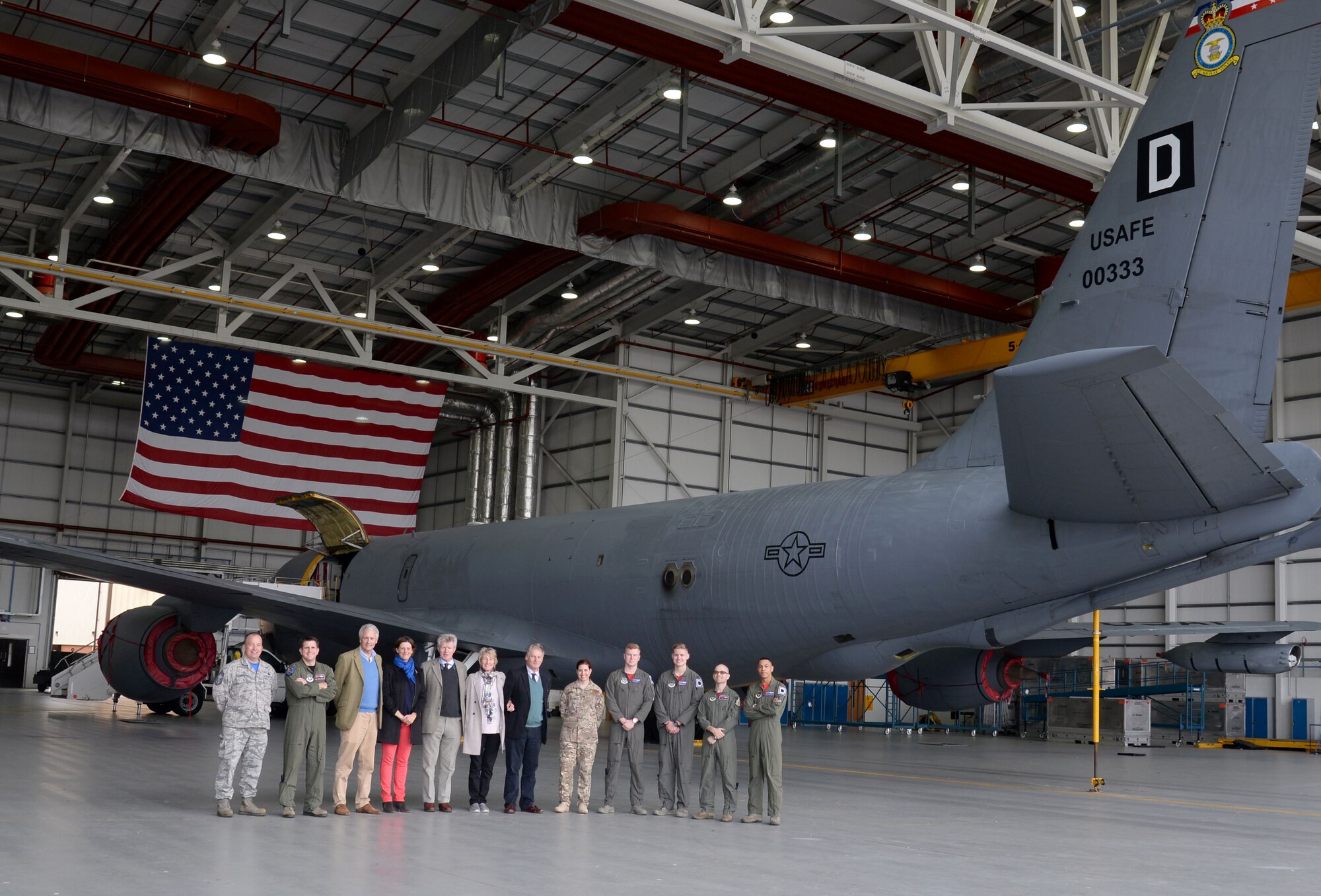Team Mildenhall leadership, Airmen and local high sheriffs pose for a group photograph in front of a 100th Air Refueling Wing KC-135 Stratotanker Oct. 13, 2017, during a base tour of RAF Mildenhall, England. The community leaders were given the opportunity to speak to Airmen and learn about their career fields. (U.S. Air Force photo by Senior Airman Justine Rho)