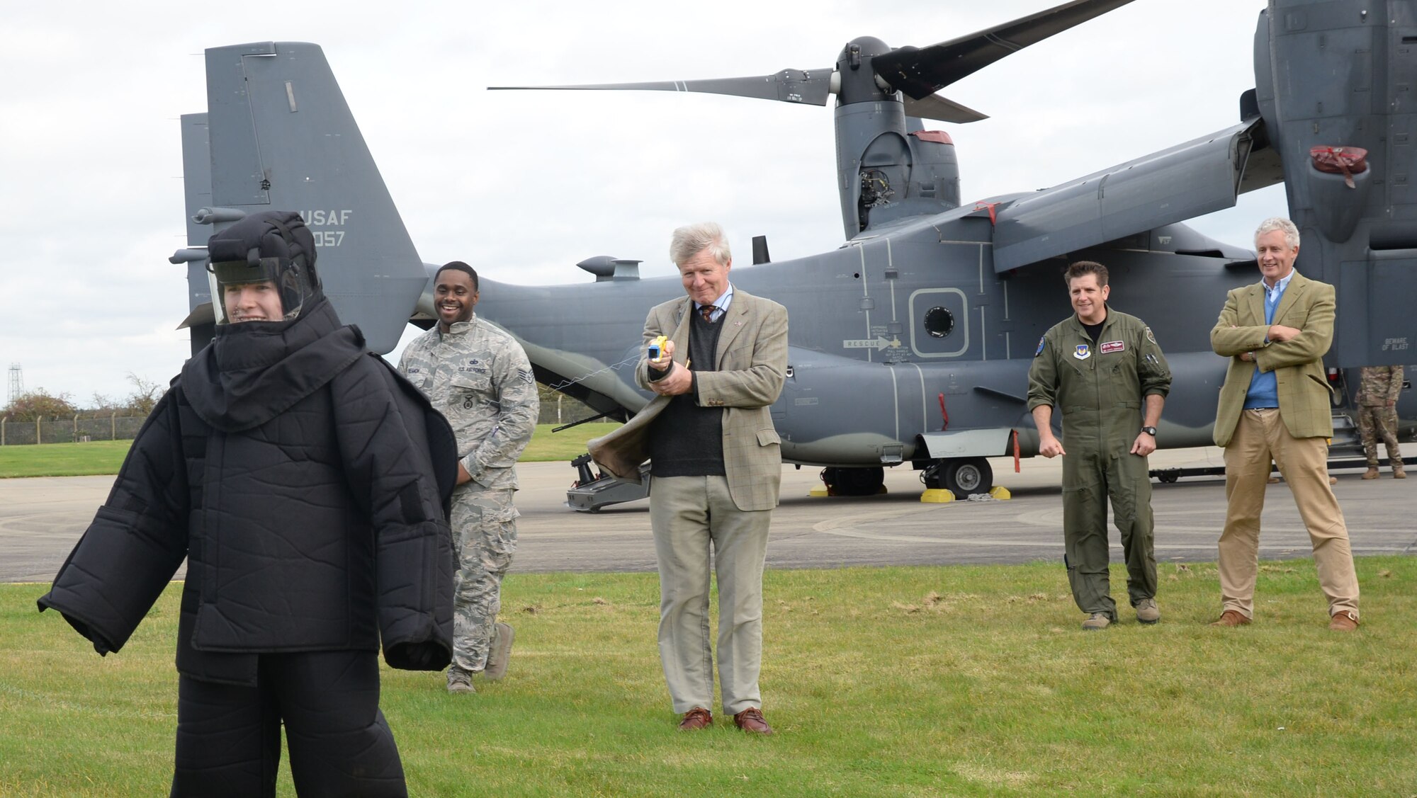 Richard Pemberton, High Sheriff of Norfolk, England, center, uses a taser on a volunteer Airman, Oct. 13, 2017, during a non-lethal weapons demonstration on RAF Mildenhall, England. Three members of the Office of High Sheriffs toured both RAF Mildenhall and RAF Lakenheath. High sheriffs are appointed for one year as active and supportive community leaders in relations to emergency responders, public and volunteer sector organizations involved in crime reduction and social cohesion. (U.S. Air Force photo by Senior Airman Justine Rho)