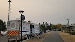 A Mobile Emergency Operations Center (MEOC) from the California Air National Guard's 163d Attack Wing at March Air Reserve Base, is set up at Napa Valley College in Napa, California, to provide communications support to victims of the Northern California fires Oct. 11, 2017.