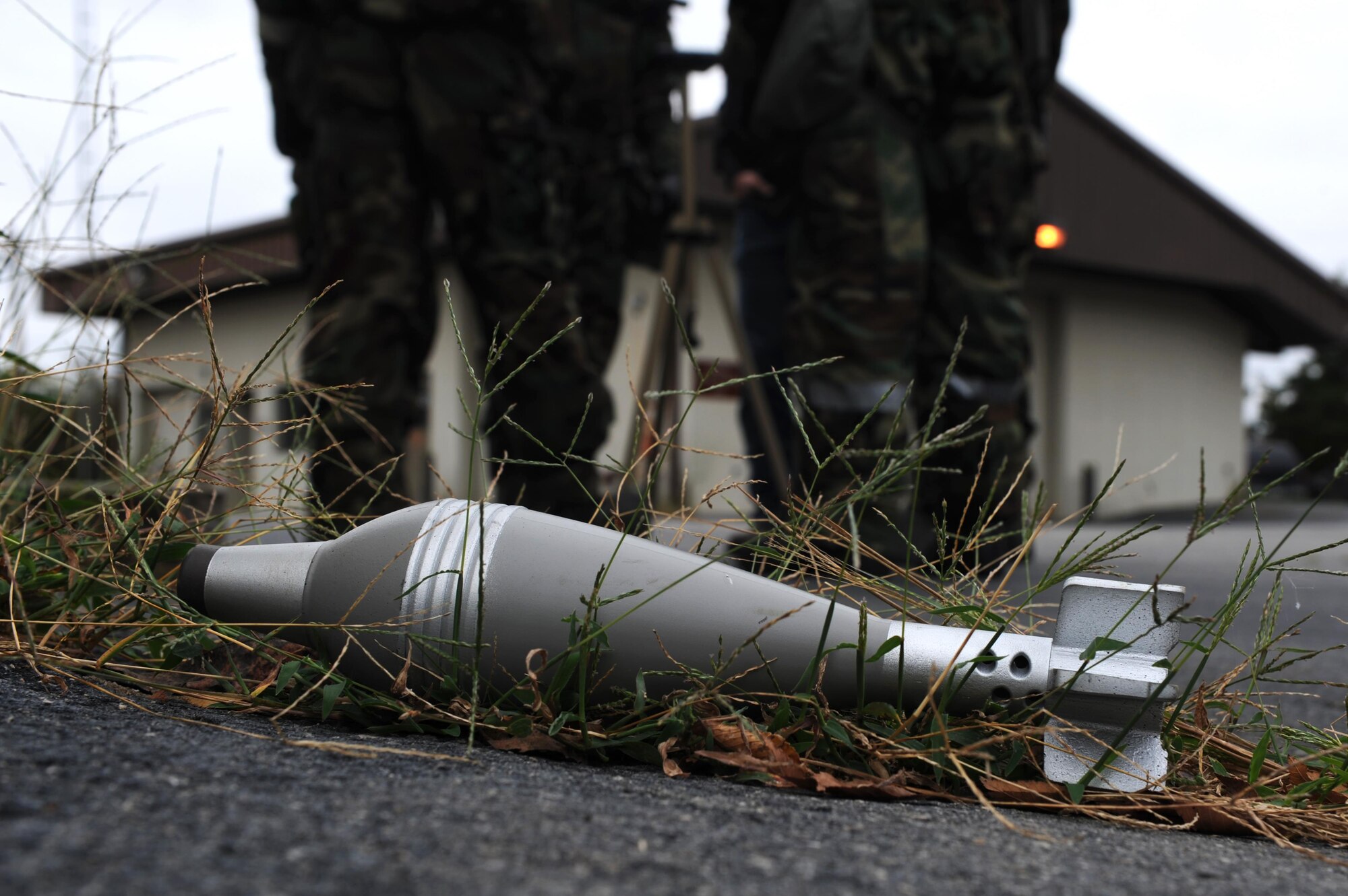 A mock unexploded ordinance is used to train Airmen how to report explosives and other hazards during Chemical, Biological, Radiological, Nuclear and high-yield Explosives training Oct. 10, 2017, at little Rock Air Force Base, Ark. CBRNE training is intended to prepare Airmen for the possibility of a chemical, biological, radiological or nuclear attack. (U.S. Air Force photo by Airman 1st Class Grace Nichols)
