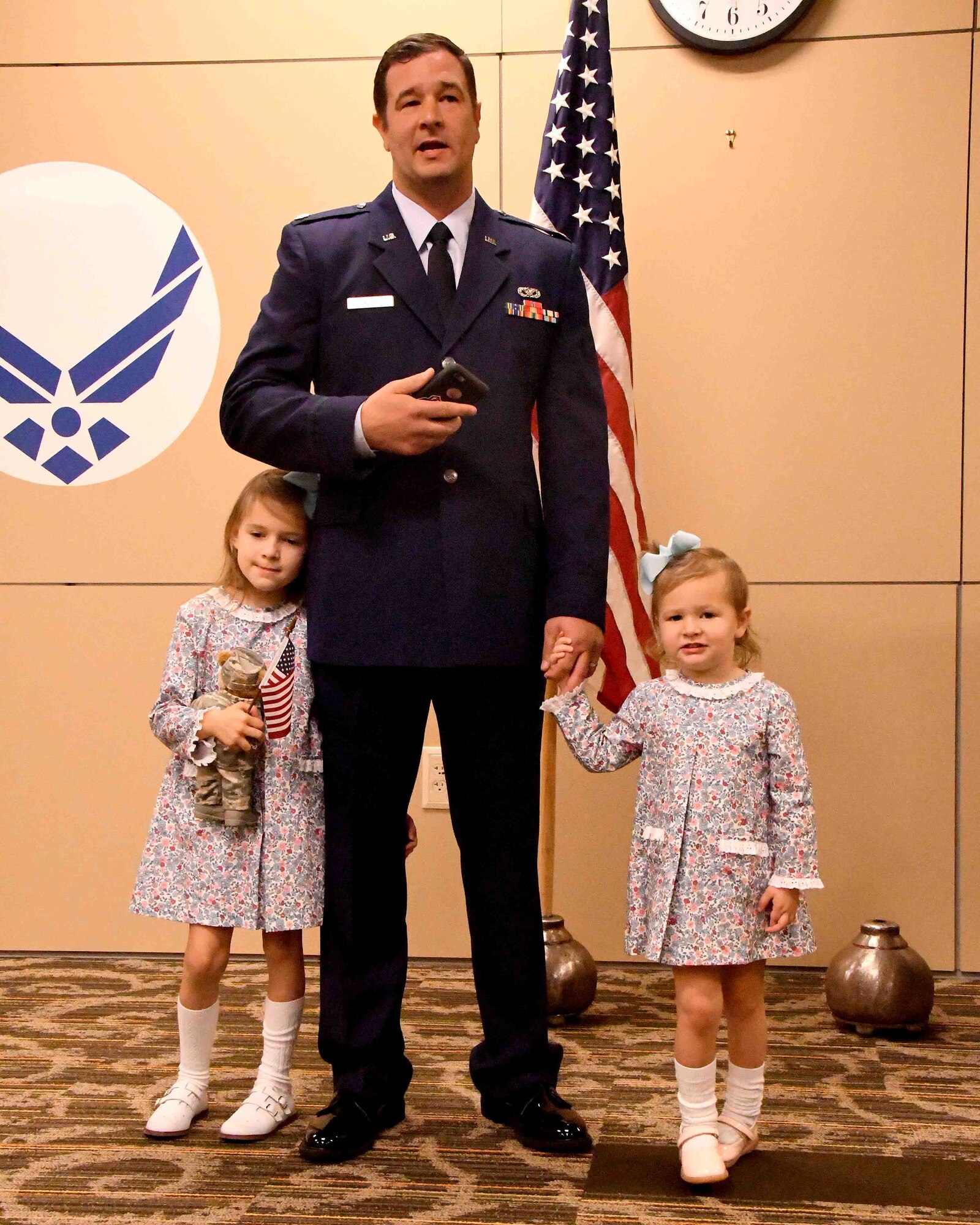 Maj. Joseph Thomas, 94th Civil Engineer Squadron commander, addresses the audience during an assumption of command ceremony at Dobbins Air Reserve Base, Georgia on Oct. 15, 2017. After officially assuming command of the squadron, his daughters Caroline and Marjorie Thomas joined him while he addressed the crowd. (U.S. Air Force photo by Staff Sgt. Jaimi L. Upthegrove)