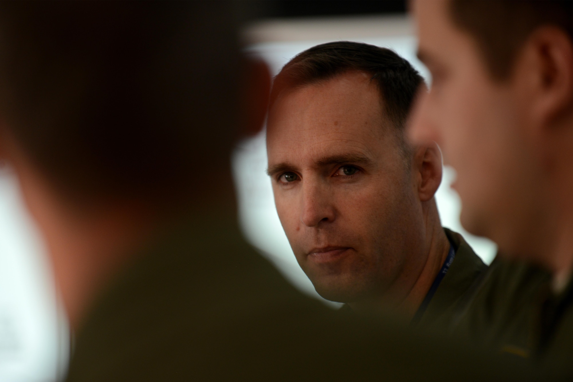 U.S. Air Force Lt. Col. Lance Allred, 435th Contingency Response Squadron director of operations, listens to a question during an Operation Atlantic Resolve mission brief on Powidz Air Base, Poland, Oct. 16, 2017. The first day of flying during this iteration of OAR was familiarization flights for the 37th Airlift Squadron and 934th Airlift Wing pilots. (U.S. Air Force photo by Staff Sgt. Jonathan Bass)