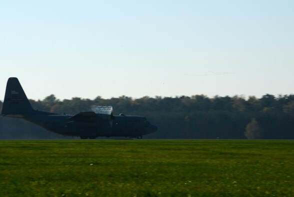 U.S. Airmen assigned to the 934th Airlift Wing, Minneapolis-St. Paul, Minnesota, take off in a C-130H Hercules from Powidz Air Base, Poland, during the latest iteration of Operation Atlantic Resolve, Oct. 16, 2017. The NATO-led exercise prepares U.S. and Polish Airmen to work together in order to increase interoperability and enhance regional security. (U.S. Air Force photo by Staff Sgt. Jonathan Bass)