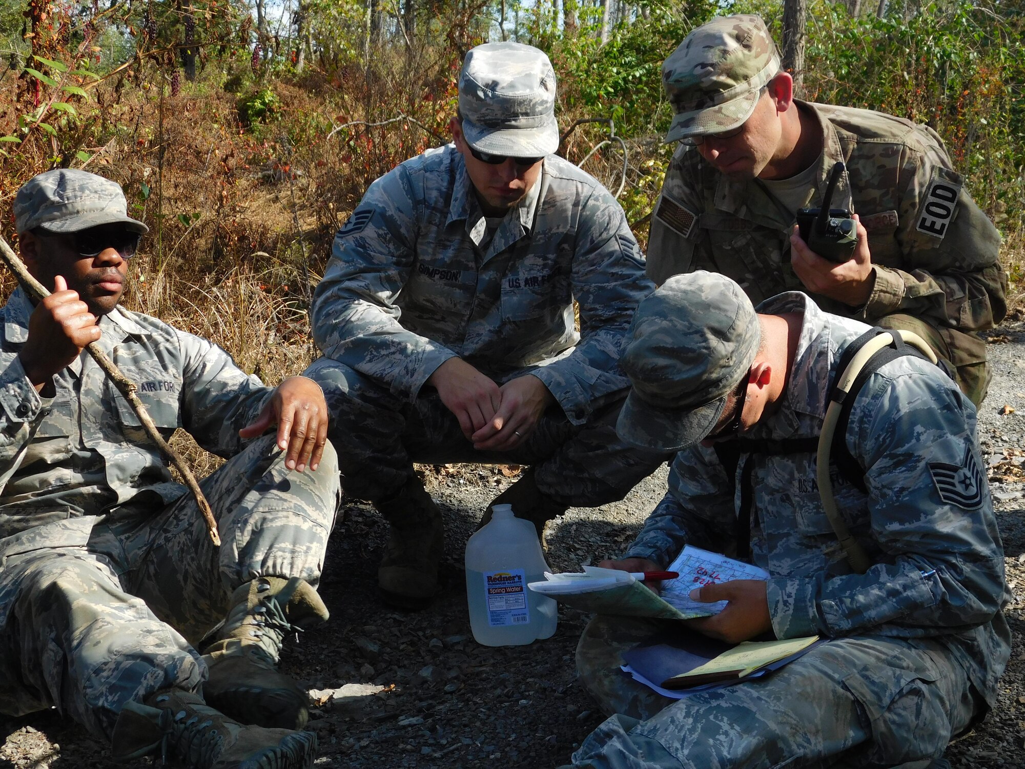 Airmen assigned to the 436th Civil Engineer Squadron practice land navigation skills Sept. 21, 2017, during a field training exercise at Fort Indiantown Gap, Pa. These skills can be used to survive and operate in remote locations around the world. (Courtesy photo)