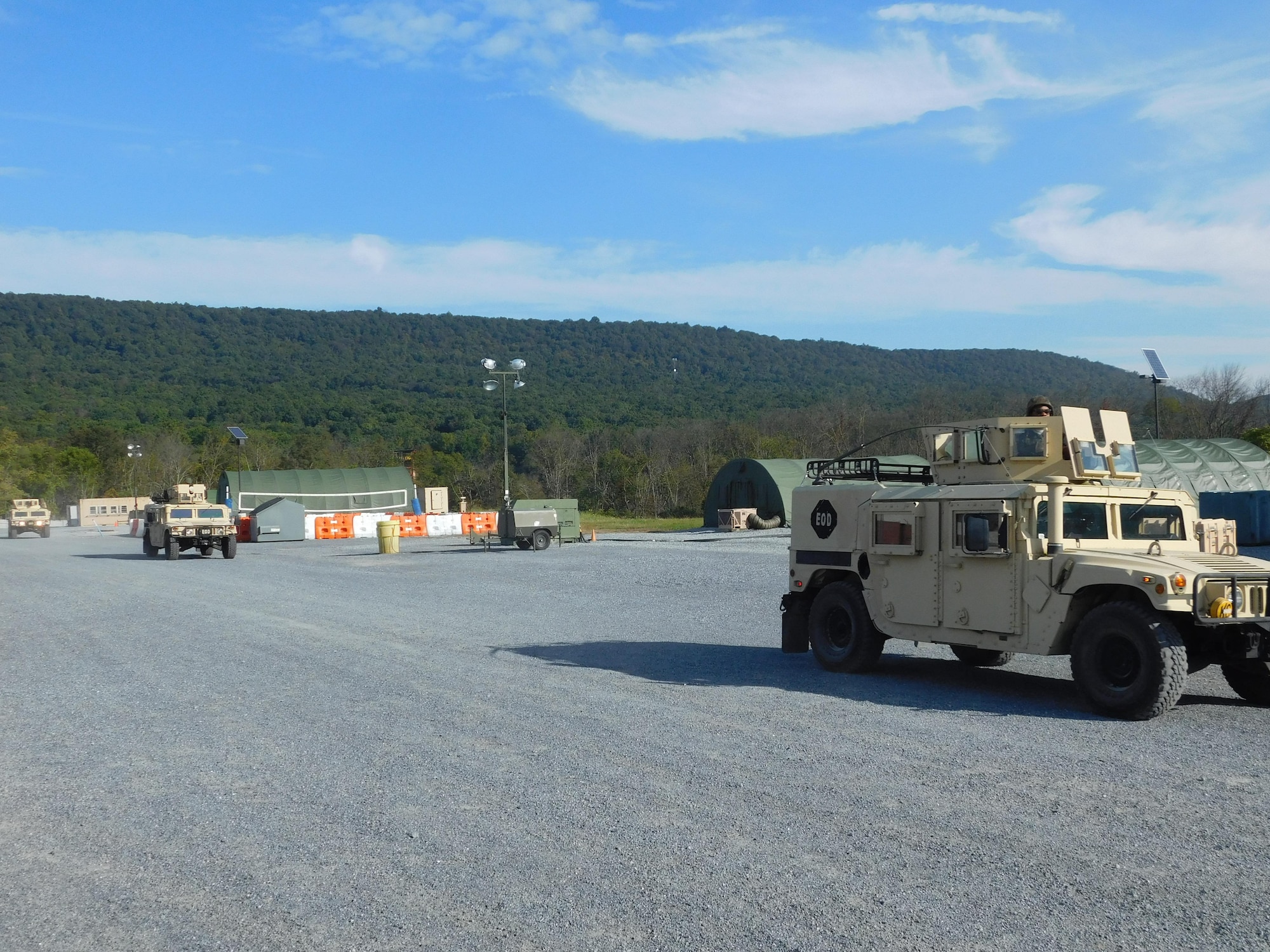 Explosive ordnance disposal technicians assigned to the 436th Civil Engineer Squadron drive an armored vehicle Sept. 22, 2017, during a field training exercise at Fort Indiantown Gap, Pa. This was the first home-station FTX to be held at a regional training site in Air Mobility Command in a dozen years. (Courtesy photo)