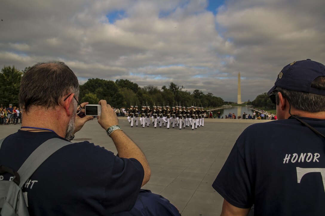 Marines with the U.S. Marine Corps Silent Drill Platoon perform for veterans with Old Glory Flight Northeast Tennessee, at the Lincoln Memorial, Washington D.C., Oct. 14, 2017. Old Glory Honor Flight is dedicated to transporting local WWII and Korean War veterans to visit memorials built to honor those service members who fought for our country. (Official Marine Corps photo by Lance Cpl. Damon Mclean/Released)