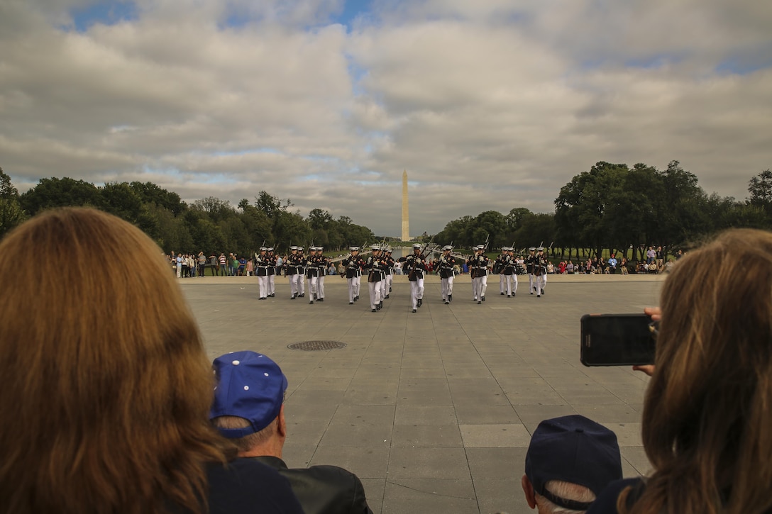 Marines with the U.S. Marine Corps Silent Drill Platoon execute precise drill movements as they perform for veterans with Old Glory Flight Northeast Tennessee, at the Lincoln Memorial, Washington D.C., Oct. 14, 2017. Old Glory Honor Flight is dedicated to transporting local WWII and Korean War veterans to visit memorials built to honor those service members who fought for our country. (Official Marine Corps photo by Lance Cpl. Damon Mclean/Released)