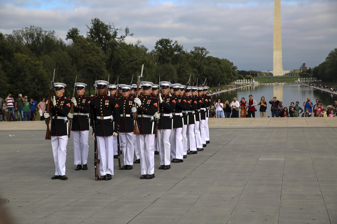Marines with the U.S. Marine Corps Silent Drill Platoon execute their “meat grinder” sequence during their performance for veterans with Old Glory Flight Northeast Tennessee, at the Lincoln Memorial, Washington D.C., Oct. 14, 2017. Old Glory Honor Flight is dedicated to transporting local WWII and Korean War veterans to visit memorials built to honor those service members who fought for our country. (Official Marine Corps photo by Lance Cpl. Damon Mclean/Released)