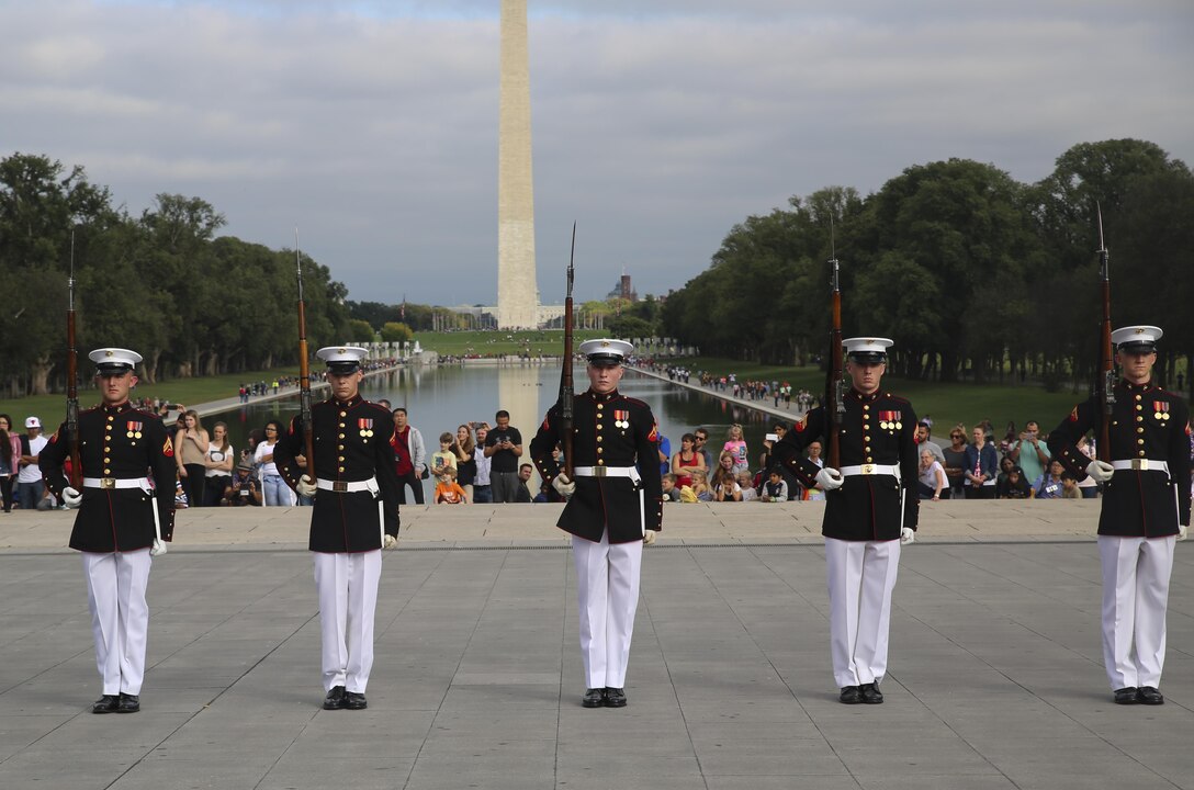 Marines with the U.S. Marine Corps Silent Drill Platoon execute their “long line” sequence during their performance for veterans with Old Glory Flight Northeast Tennessee, at the Lincoln Memorial, Washington D.C., Oct. 14, 2017. Old Glory Honor Flight is dedicated to transporting local WWII and Korean War veterans to visit memorials built to honor those service members who fought for our country. (Official Marine Corps photo by Lance Cpl. Damon Mclean/Released) 020  021