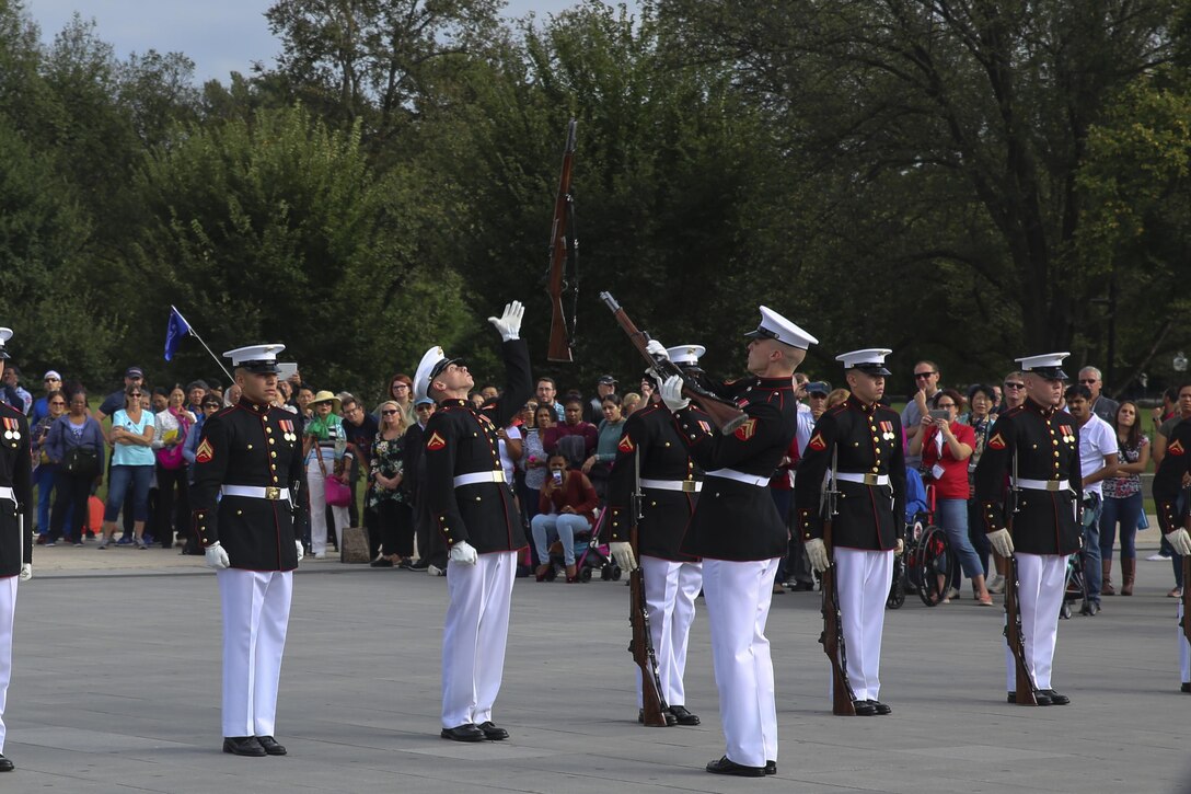 Corporal Jarris Wade, rifle inspector, U.S. Marine Corps Silent Drill Platoon, and Lance Cpl. Daniel Linebaugh, rifle inspection team, SDP, execute precision drill movements during a performance for veterans with Old Glory Flight Northeast Tennessee, at the Lincoln Memorial, Washington D.C., Oct. 14, 2017. Old Glory Honor Flight is dedicated to transporting local WWII and Korean War veterans to visit memorials built to honor those service members who fought for our country. (Official Marine Corps photo by Lance Cpl. Damon Mclean/Released)
