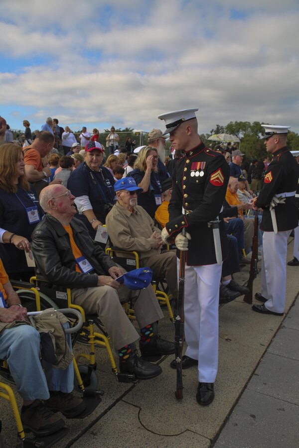 Marines with the U.S. Marine Corps Silent Drill Platoon meet and greet veterans with Old Glory Honor Flight Northeast Tennessee, after their performance at the Lincoln Memorial, Washington D.C., Oct.  14, 2017. Old Glory Honor Flight is dedicated to transporting local WWII and Korean War veterans to visit memorials built to honor those service members who fought for our country. (Official Marine Corps photo by Lance Cpl. Damon Mclean/Released)