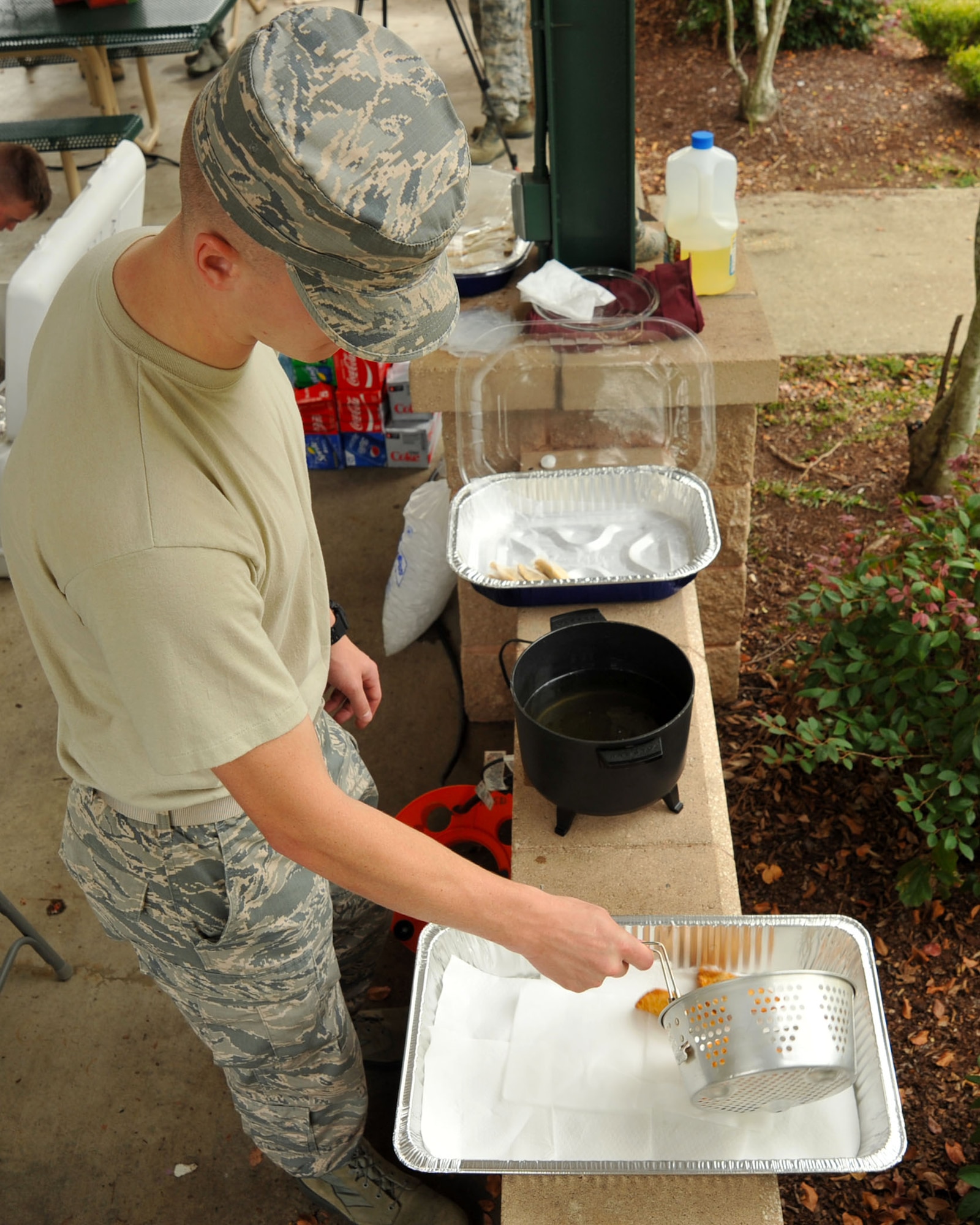 U.S. Air Force Airman Adam O’Donnell, U.S. Air Forces Central Command cyber systems apprentice and event volunteer, prepares empanadas during a Hispanic Heritage Month finale at Shaw Air Force Base, S.C., Oct. 12, 2017.