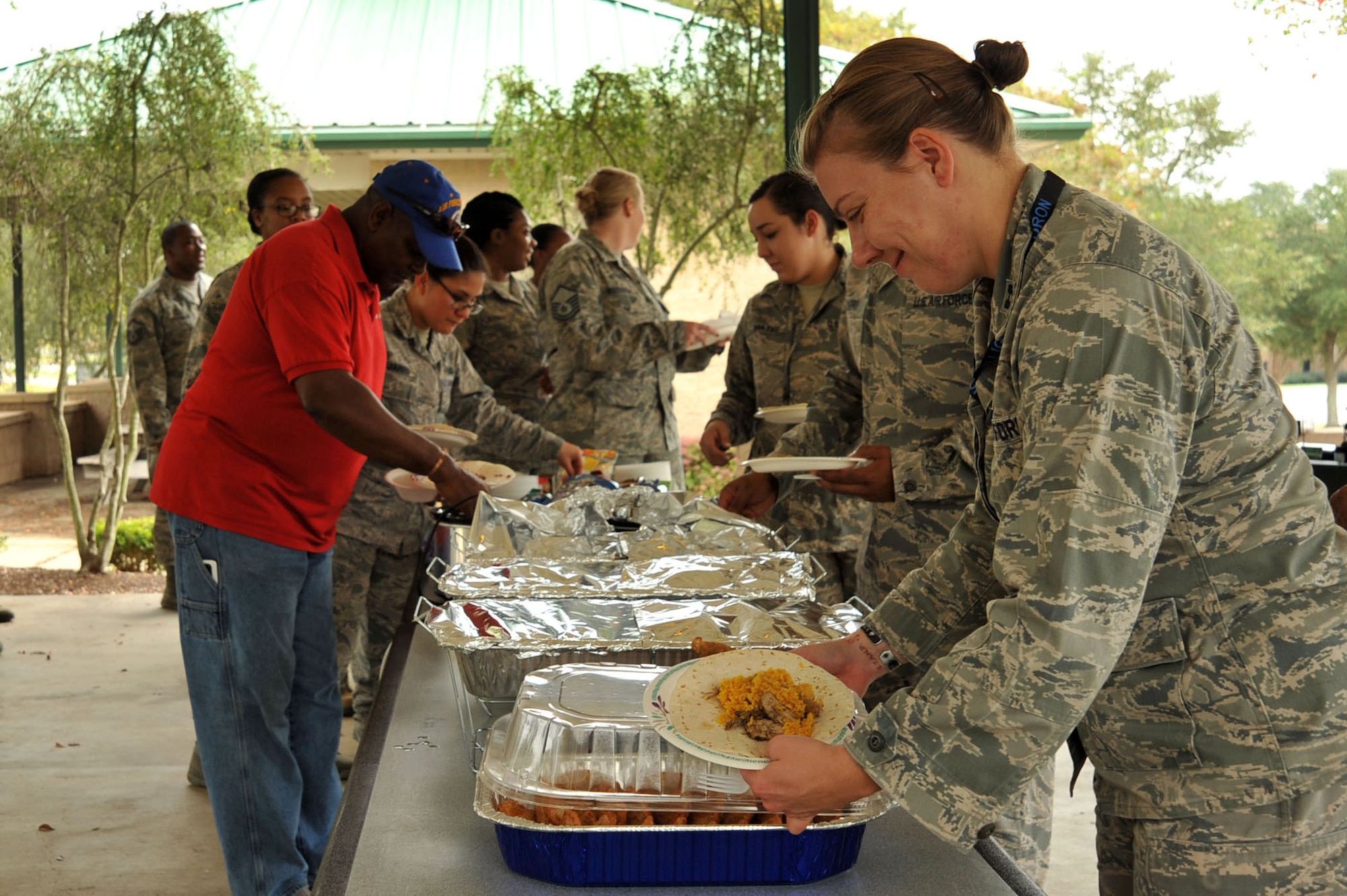 Team Shaw members gather for a potluck lunch of Hispanic foods during a Hispanic Organization for Latin Appreciation hosted finale event for Hispanic Heritage Month at Shaw Air Force Base, S.C., Oct. 12, 2017.