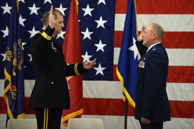 Maj. Gen. Al Dohrmann (left), North Dakota adjutant general, administers the commissioning oath to newly-promoted Brig. Gen. Todd Branden Oct. 7, 2017, during a promotion ceremony held at the North Dakota Air National Guard Base in Fargo, North Dakota. Branden, who now will serve as the North Dakota National Guard assistant adjutant general, Air, is the organization’s newest general officer.