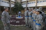 Airmen attending Airman’s Week speak with their instructor about the significance of squadron symbols and lineage Jan 21, 2015, at Joint Base San Antonio-Lackland’s Airmen’s Week, a five-day course implemented in March 2015 that helps Airmen better prepare for technical training school and beyond.