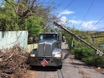 Fuel truck drives through debris in Puerto Rico