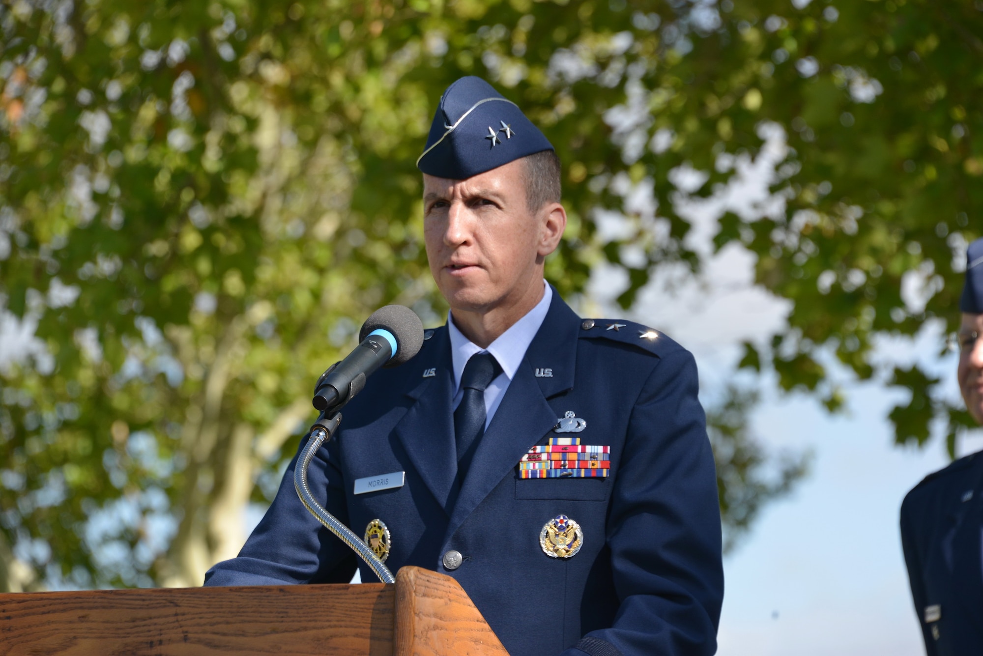 Maj. Gen. Shaun Q. Morris, Air Force Nuclear Weapons Center's new commander, speaks to the audience at his change of command ceremony Oct. 6 at Hardin Field.