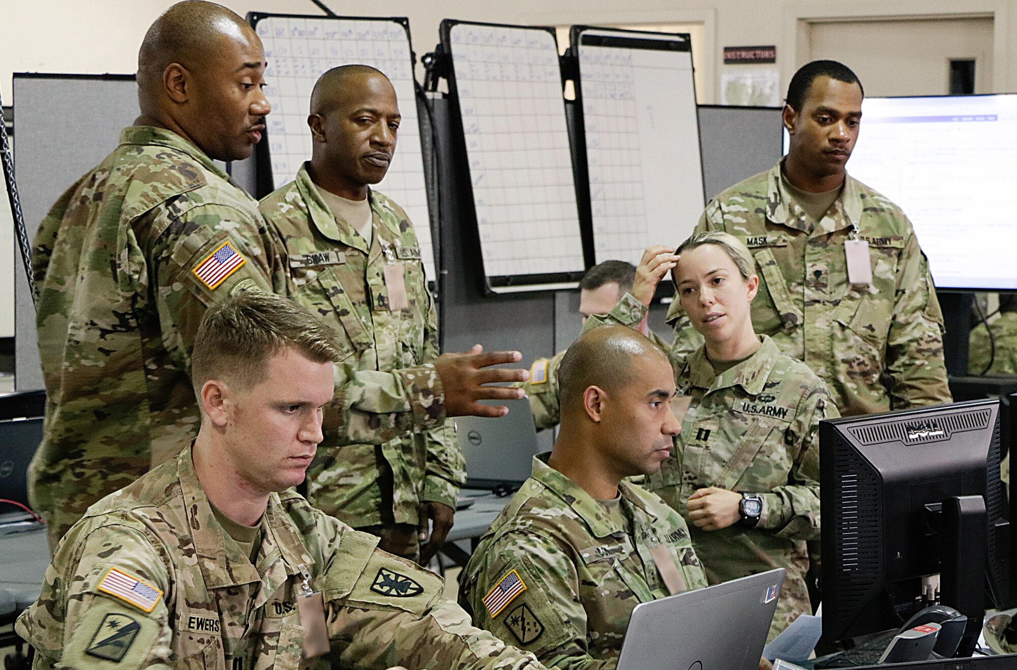 U.S. Army leaders from Headquarters and Headquarters Company, 7th Transportation Brigade (Expeditionary), support Soldiers from the 143rd Expeditionary Sustainment Command, Army Reserve, during a warfighter exercise at Ft. Indiantown Gap, Pa., Oct. 8, 2017.