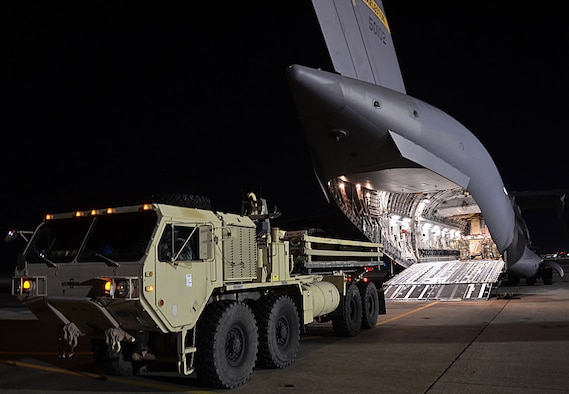 U.S. Army Soldiers from the 832nd Transportation Battalion, 597th Transportation Brigade, load a vehicle onto a U.S. Air Force Air Mobility Command C-17 at Joint Base Langley-Eustis, Va., Oct. 18, 2017.