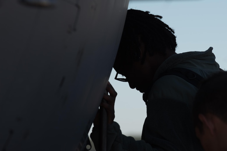 A U.S. Air Force Airman assigned to the 633rd Medical Group boards a U.S. Air Force C-130 Hercules at Joint Base Langley-Eustis, Va., Oct. 18, 2017.