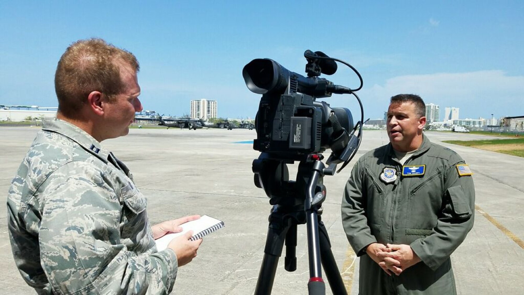 Capt. David J. Murphy, 81st Training Wing public affairs chief, interviews Maj. Gen. Thomas J. Sharpy, the joint forces land component deputy commander in charge of air operations and deputy commander for Air Mobility Command, in San Juan, Puerto Rico, Oct. 8, 2017.