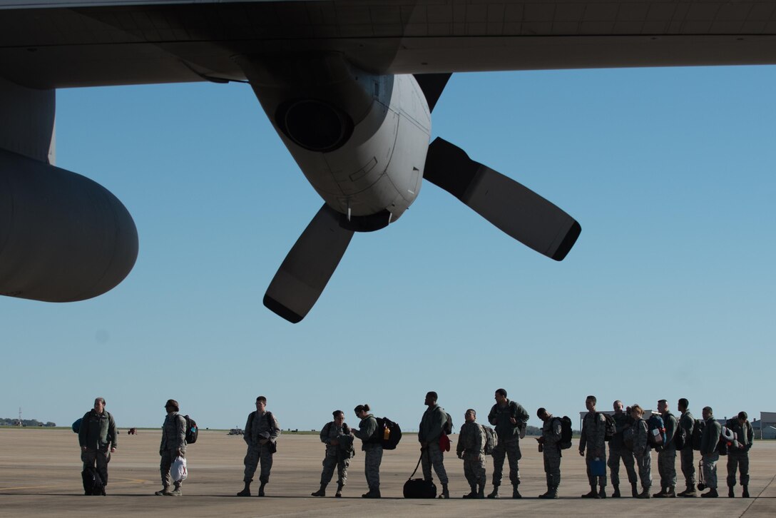U.S. Air Force Airmen assigned to the 633rd Medical Group deploy from Joint Base Langley-Eustis, Va., Oct. 18, 2017. While deployed, the medical team set up and operated a 25-bed Expeditionary Medical Support field hospital in support of Puerto Rican hurricane relief. (U.S. Air Force photo by Tech. Sgt. Natasha Stannard)