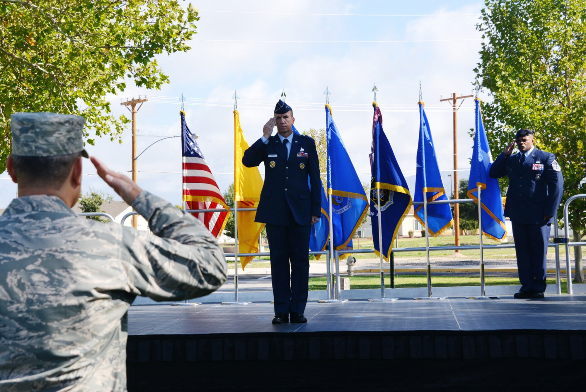 Maj. Gen. Shaun Q. Morris, Air Force Nuclear Weapons Center's new commander, issues his first salute at his change of command ceremony Oct. 6 at Hardin Field.