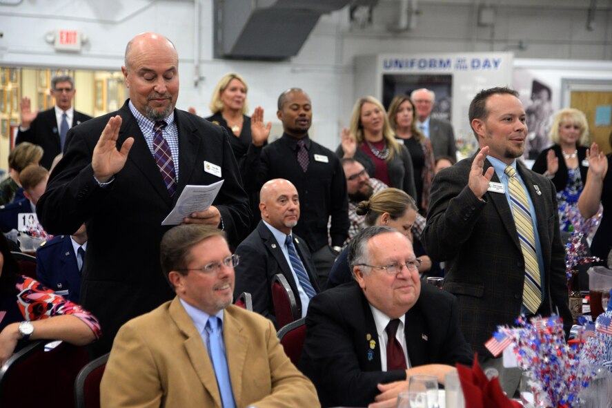 Members of Team Dover and civic leaders meet during the Honorary Commander’s Induction Ceremony at the Air Mobility Command Museum on Dover Air Force Base, Del. Oct. 14, 2017. The program was started to help members of the community understand the importance of the base’s missions by being matched with military commanders.