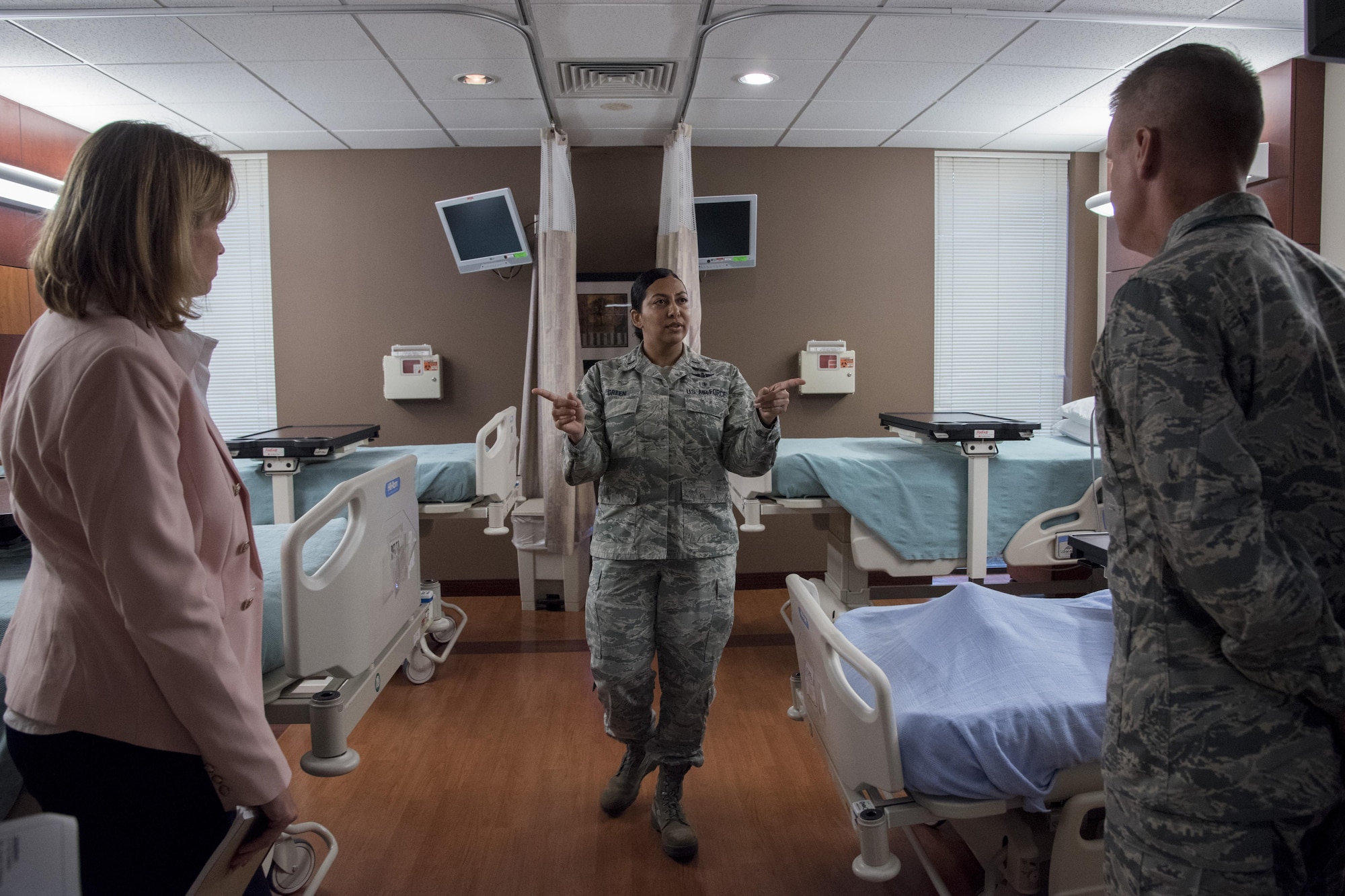 Maj. Gen. Jacobson & Mrs. Jacobson learn about 11th MDG