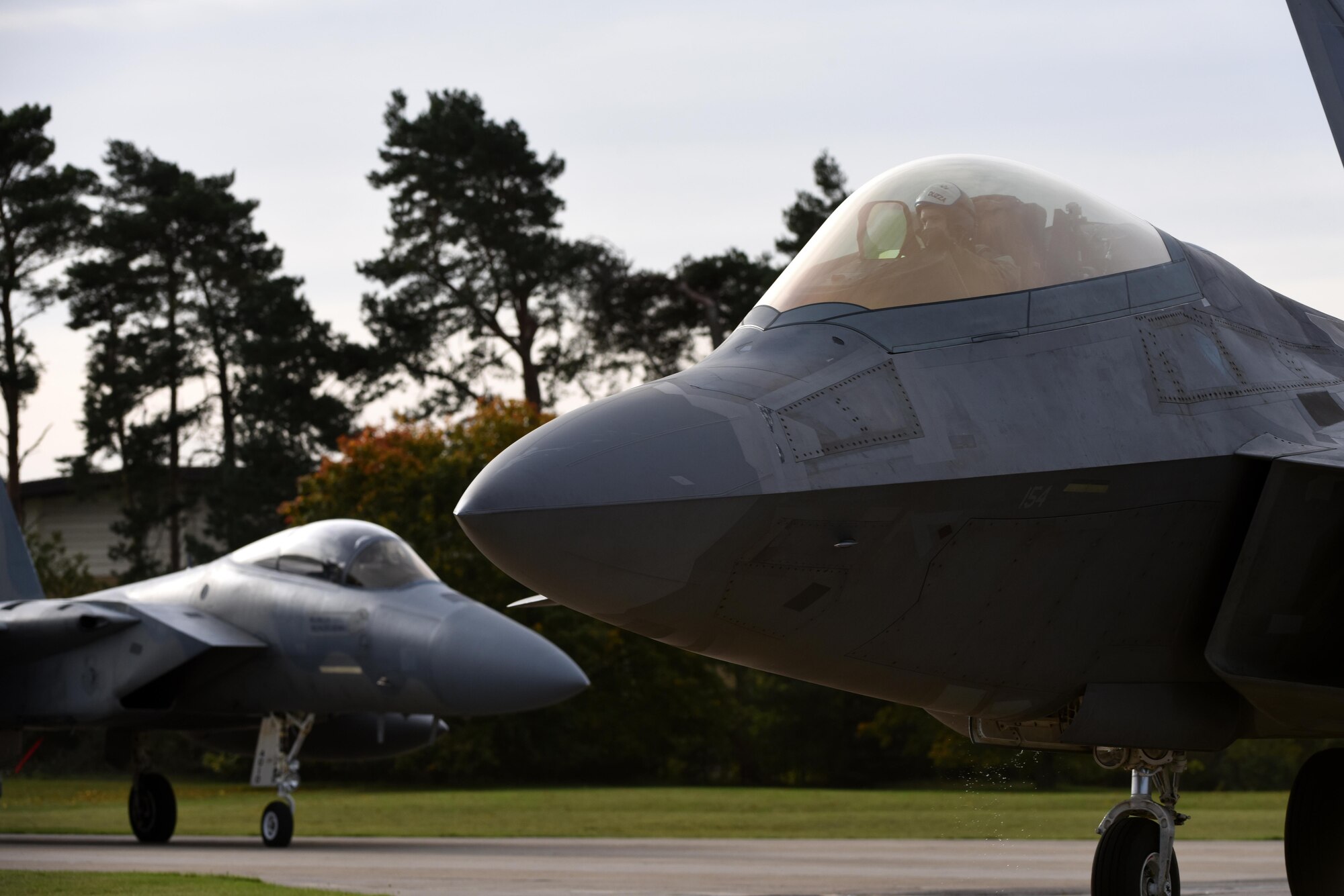 An F-22 Raptor from the 1st Fighter Wing, Joint Base Langley-Eustis, Virginia taxiis prior to take off at Royal Air Force Lakenheath, England, Oct. 12, 2017. Airmen and aircraft from the 48th Fighter Wing, the 1st Fighter Wing and the Royal Air Force have been training together during Exercise Eastern Zephyr, which started Oct. 10. (U.S. Air Force photo/Airman 1st Class Eli Chevalier