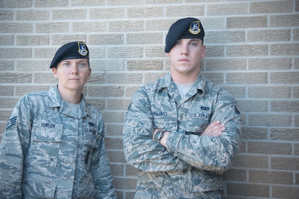 Staff Sgt. Emily Fowler and Senior Airman Jonathan Kling, 403rd Security Forces Squadron fire team members, pose for a photo after completing U.S. Army Air Assault School Sept. 26, 2017 at Keesler Air Force Base, Mississippi. (U.S. Air Force photo/Staff Sgt. Heather Heiney)