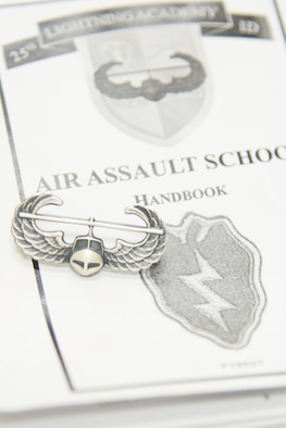 Members of the 403rd Security Forces Squadron show off their new Air Assault badges after completing U.S. Army Air Assault School Sept. 26, 2017 at Keesler Air Force Base, Mississippi. (U.S. Air Force photo/Staff Sgt. Heather Heiney)