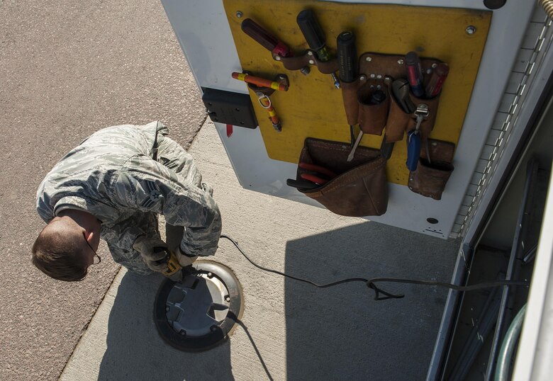 The 5th Civil Engineer Squadron electrical systems Airmen are responsible for maintaining all electrical systems on base, including airfield lighting systems, lighting protection systems and fire alarm systems.
