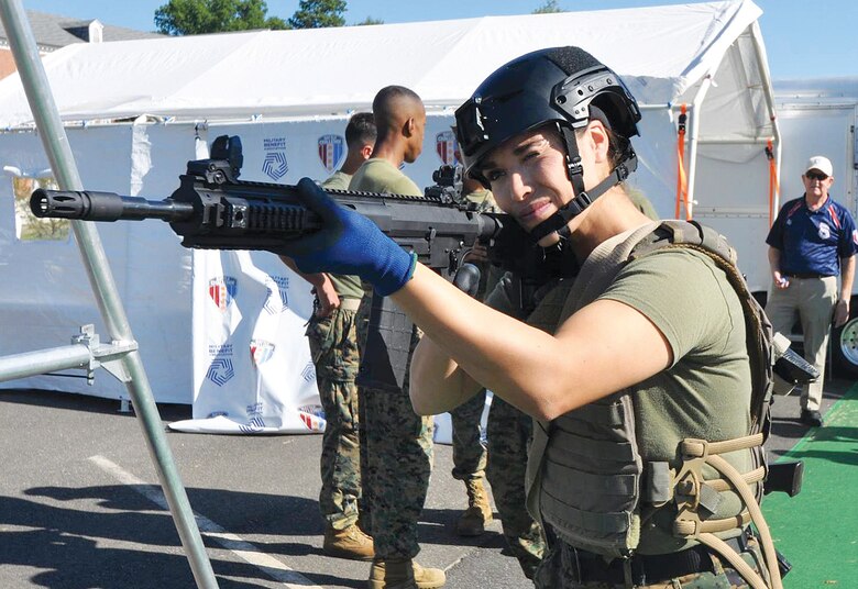 Female Marine scopes out the course before stepping onto the start line.