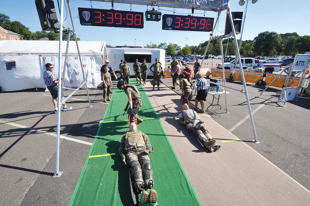Two female Marines finishing the final stretch of the Battle Challenge.