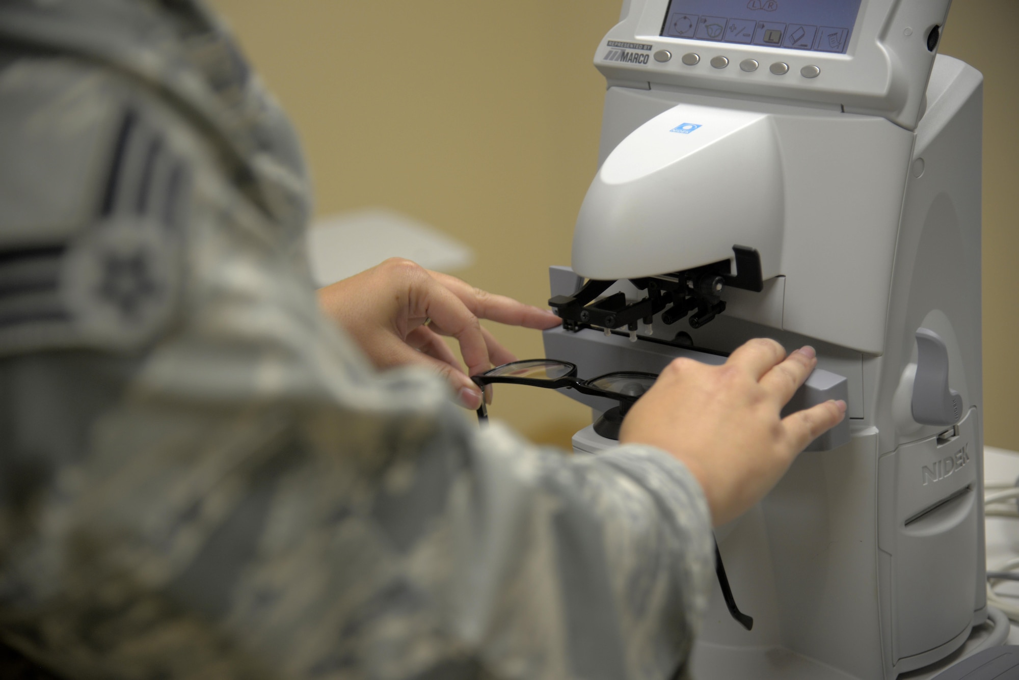 U.S. Air Force Senior Airman Sarai Boehm, an ophthalmic technician assigned to the 6th Aerospace Medical Squadron, checks prescription glasses using a Lensometer at MacDill Air Force Base, Fla., Oct. 17, 2017.