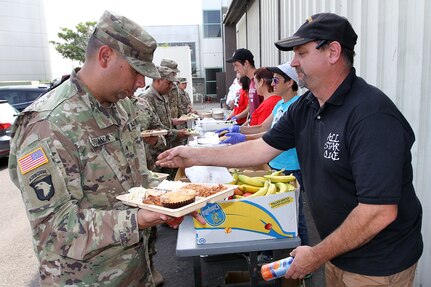 Private businesses join volunteers and other organizations in providing meals to California Army National Guardsmen who are activated for the 2017 Northern California wildfires.