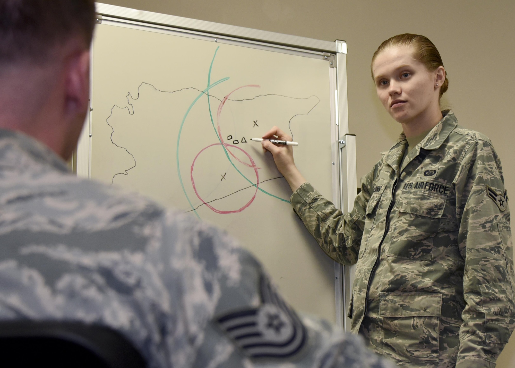 Airman 1st Class Allison Dassing responds to a simulated intelligence threat situation Oct. 3, 2017 at Warfield Air National Guard, Middle River, Md. Dassing is a fulltime intelligence technician but in her free time enjoys spending time with family, travelling and video games. (U.S. Air National Guard photo by Senior Airman Enjoli Saunders)