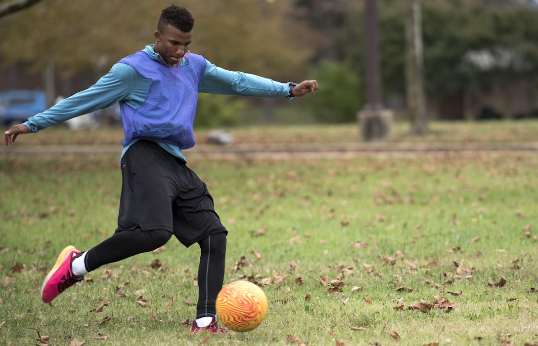 Airman kicks ball