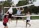 Airmen play volleyball