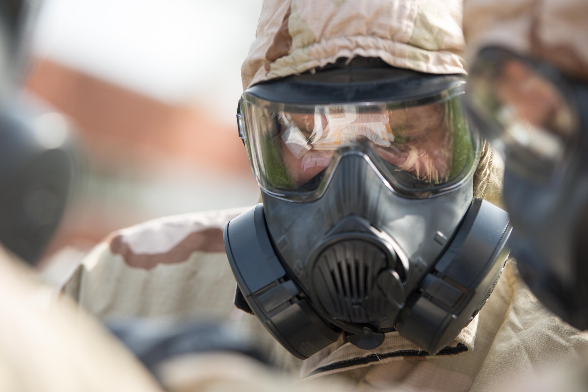 Master Sgt. Kyle Sunne, of the 934th Civil Engineering Squadron, consults his Airman's Manual during a PAR exercise Oct. 14. (U.S. Air Force photo by Tech. Sgt. Trevor Saylor)