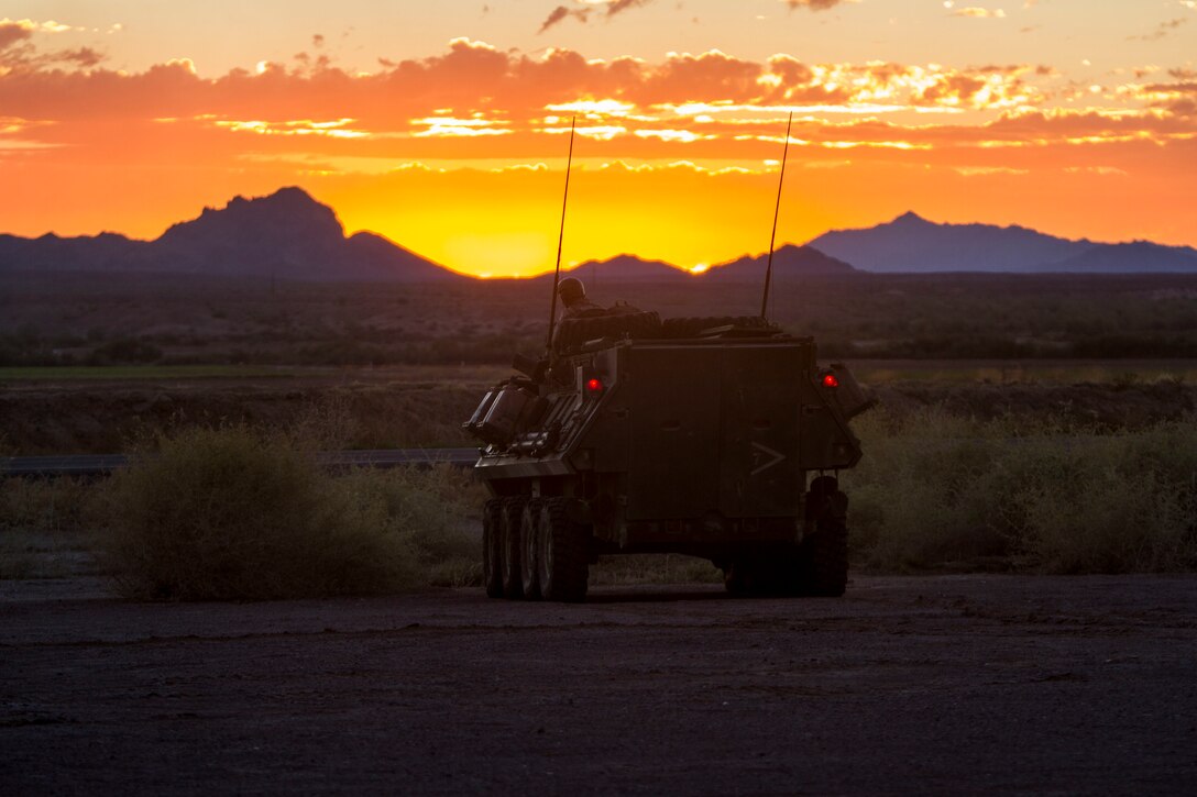 Marines with Company B, 1st Light Armored Reconnaissance Battalion, 1st Marine Division, hold security in a light armored vehicle during Deep Strike II in the River Valley, Calif., Sept. 12, 2017.