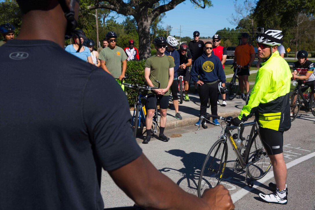 Brig. Gen. David W. Maxwell, the commanding general for 2nd Marine Logistics Group, gives a safety brief prior to a unit bike ride at Camp Lejeune, N.C. Oct. 18, 2017. The bike ride afforded participants the opportunity to come together and strengthen unit cohesion and camaraderie. The Participants are with 2nd Marine Logistics Group. (U.S. Marine Corps photo by Pfc. Nicholas Guevara