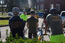 Brig. Gen. David W. Maxwell, the commanding general for 2nd Marine Logistics Group, speaks to Marines and Sailors prior to a unit bike ride at Camp Lejeune, N.C. Oct. 18, 2017. The bike ride afforded participants the opportunity to come together and strengthen unit cohesion and camaraderie. The Participants are with 2nd Marine Logistics Group. (U.S. Marine Corps photo by Pfc. Nicholas Guevara)