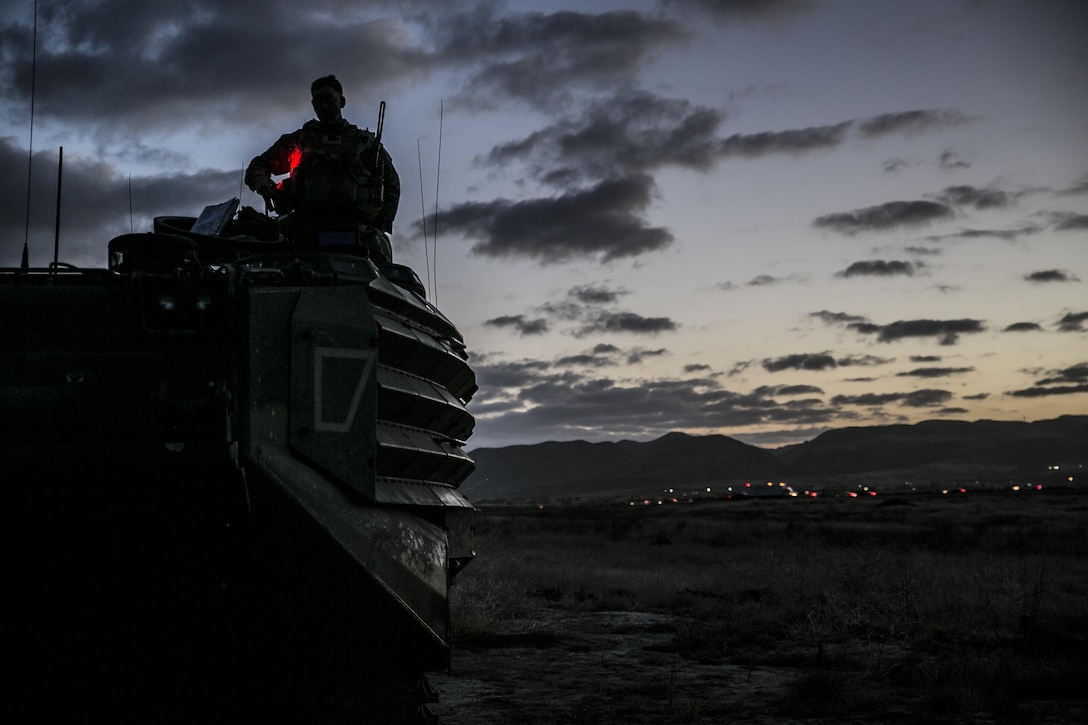 Marines with 2nd Battalion, 1st Marine Regiment, 1st Marine Division, utilize Amphibious Assault Vehicles during a Marine Corps Combat Readiness Evaluation at Marine Corps Base Camp Pendleton, Calif., June 12, 2017.