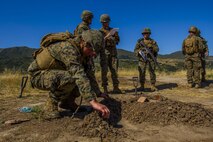 Marines with 4th Combat Engineer Battalion, 4th Marine Division, create a terrain model during the SAPPER Squad Competition held at Camp Pendleton, Calif., from June 12 to 16, 2017.